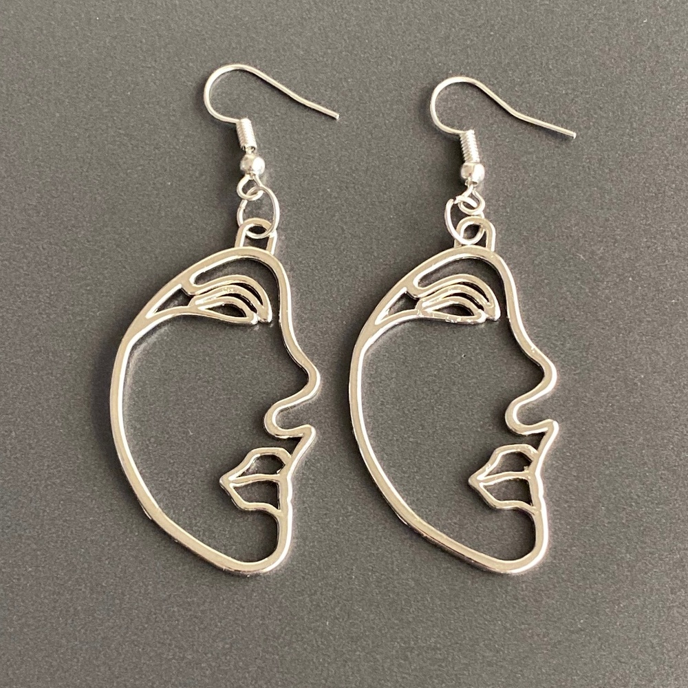 NEW Human Face Earrings in Silver color